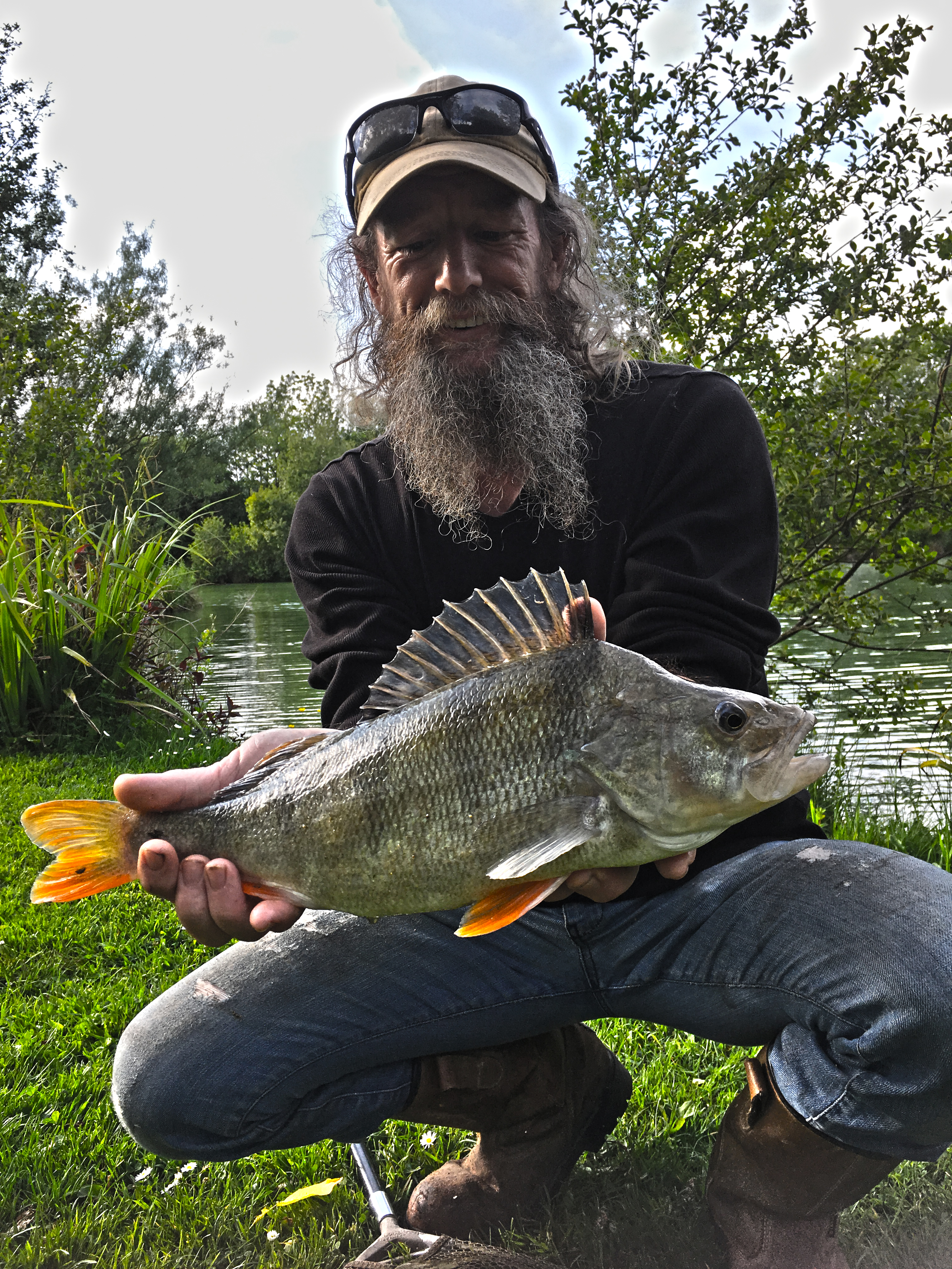 John and this lovely looking Perch - M & B Fishery